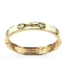 Shift into neutrals with this chic stretch bangle by AK Anne Klein. Crafted in gold tone mixed metal with ivory enamel accents. Bracelet stretches to fit wrist. Approximate diameter: 2-1/2 inches.