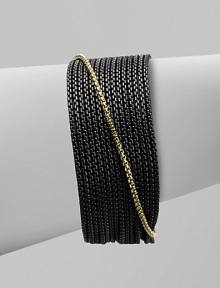 From the Chain Collection. A sizable design with sleek blackened sterling silver box link chains and an 18k gold box link chain accent. Blackened sterling silver18k goldLength, about 7Push clasp closureImported 