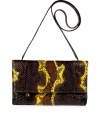 Invest in multi-season sophistication with Nancy Gonzalezs sleek fold-over python clutch, an ultra luxurious choice in cool chocolate and lemon - Fold-over with hidden magnetic snaps and zippered pocket underneath, back slit pocket with magnetic closure, inside zippered back wall pocket, chocolate suede lining, removable shoulder strap - Carry as a finish to chic day and evening looks alike