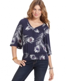 American Rag's slouchy-chic top features a feathery print that adds spice to your skinny jeans or colored cords!