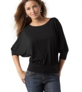 Studio M updates the basic knit top with a chic dolman sleeve and trendy banded hem.