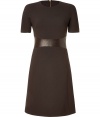 Tailored to perfection with an ultra modern leather accented waistline, Michael Kors chocolate stretch wool sheath cuts an impeccable figure - Rounded neckline, short sleeves, exposed back zip, fitted top, slight A-line skirt - Pair with luxe pumps and a streamlined tote