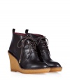 Finish daytime looks on a Downtown-cool note with Marc by Marc Jacobs espresso leather lace-up booties, detailed with crepe wedges for a that modern-classic feel - Rounded toe, stitched welt, rounded cotton laces, logo aglets, natural crepe sole unit - Perfect for adding a cool edge to contemporary tops and printed pants