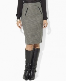 Look sophisticated and elegant at the office wearing Lauren by Ralph Lauren's chic wool houndstooth pencil skirt, accented with faux-leather trim and equestrian details.