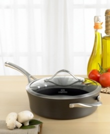 Sauté vegetables, lean cuts of meat and more in this versatile 3-quart pan. Part of the contemporary nonstick collection, it has a unique vessel shape and hard-anodized construction. Loaded with intelligent features like a capacity indicator line on the rim, high sides to contain flipped and shaken food, a durable tempered glass lid and an ergonomic handle that stays cool during stovetop cooking.