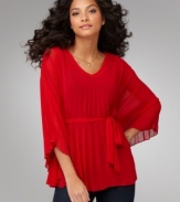 Totally elegant and pleasingly textural, Cha Cha Vente's pleated, belted blouse elevates any outfit!