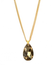 Gilt-y pleasure. An alluring amber-hued faceted glass teardrop pendant complements the gold tone mixed metal setting of Kenneth Cole New York's necklace. Includes a signature gift box. Approximate length: 18 inches + 3-inch extender. Approximate drop: 1-1/2 inches.