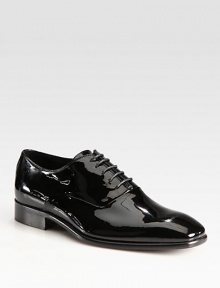 EXCLUSIVELY OURS. Elegant, Italian-crafted lace-ups in glossy patent leather: the perfect accompaniment to formal occasions. Leather liningRubber soleMade in Italy