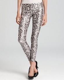 Rendered in a daring snakeskin print, these sleek lacquered leggings from HUE are bound to make a head-turning statement.