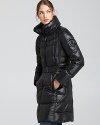 A glossy lacquered finish lends modern edge to this oh-so-cozy down coat from Add Down.