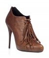 Luxurious brown leather pumps with edgy fringe detail and a stiletto heel - Retro-meets-modern with this classically designed pump with a twist - Pair with straight-leg jeans and a bohemian blouse - For laid-back luxe, try these with pleated wool shorts, ribbed tights, and a chunky sweater