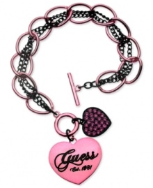 GUESS spreads the love with this toggle closure bracelet. Crafted from sprayed jet mixed metal, rose is the color of choice with the tone shining throughout, down to the sparkling accents. Approximate length: 7-1/2 inches. Approximate drop: 1 inch.