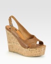 Strappy adjustable leather slingback with a natural cork wedge can be perfectly paired with your favorite sundress or shorts. Cork wedge, 4½ (115mm)Cork platform, 1½ (40mm)Compares to a 3 heel (75mm)Leather upperLeather liningRubber solePadded insoleImported