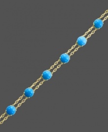 Double up on polish, while infusing color into your look. Carlo Viani's chic, double strand bracelet highlights turquoise beads (12-1/2 mm) set in 14k gold. Approximate length: 7-1/2 inches.