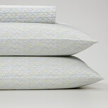 Set the mood for bedtime bliss. Pattern-printed sheet set in light, summery hues. Comes in a soft cotton.