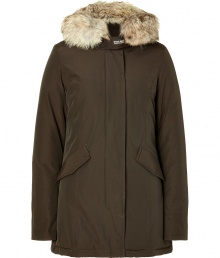 Stylish and sporty dark brown down coat in a washable cotton blend from the American heritage label Woolrich - Tapers slightly at waist, hits at mid-thigh - Rabbit fur collar lends this coat a veritable feeling of warmth and luxe - Water and snow resistant, with multiple pockets and hood - Exceptionally warm, can be worn in temperatures as low as -30 F - A versatile, classically elegant coat that can be worn for life - Perfect for both city streets and country slopes