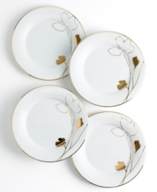 Wildflowers take off on glazed white porcelain, glowing as they tumble aimlessly around these Charter Club appetizer plates. A banded edge adds a classic touch to a pattern with modern spirit.