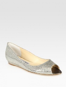 Glitzy metallic leather flat updated by an unexpected peep toe. Pebbled metallic leather upperLeather lining and solePadded insoleMade in ItalyOUR FIT MODEL RECOMMENDS ordering one half size up as this style runs small. 