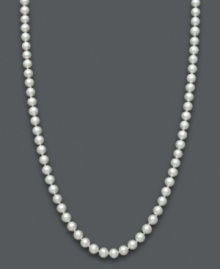 Pretty as a picture. Cultured freshwater pearls (5-6 mm) are arranged in a delicate strand necklace that is perfect for celebrating any child's milestone and is worth cherishing for years. Necklace set in brilliant 14k gold. Approximate length: 14 inches.