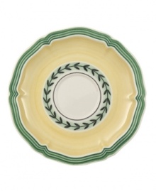 In sunny yellow porcelain with a scalloped edge and pretty vine detail, this French Garden after-dinner saucer is perfectly at home on casual country tables.