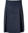 Elegant skirt made ​.​.from a fine, navy blue cotton blend - Stylish textured pattern - Fashionable alternative to a classic business skirt, wear in office, agency - Slim, about knee-length cut, with box pleats which spring up slightly when you walk - Can be paired with slim blouses and shirts, blazers, twin sets and pumps, mules