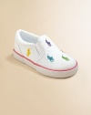 Smart, sturdy cotton canvas slip-ons, sprinkled with bright polo ponies, mix and match her summer play clothes.Cotton canvas upperElasticized side goresPlush terry liningRubber soleImported