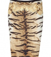 Bring bold style to your day or night look with this luxe printed stretch silk skirt from Roberto Cavalli - Slim pencil silhouette, all-over animal print with black trim and scarf print at hips, concealed side zip closure - Style with a sheer blouse, a bold shoulder blazer, and platform pumps