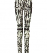 Get of-the-moment style with these unbelievable tribal-print pants from Parisian It Label Balmain - Low rise, fold-over snap-detailed front, belt loops, side slit pockets, back patch pockets, super slim fit, all-over print, zip detailed hem - Wear with a high-low hem top, a draped front leather jacket, and platform pumps