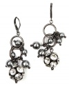 Chic and coordinated. A hematite tone mixed metal setting complements the gray acrylic pearls on AK Anne Klein's stylish drop earrings. Sparkling glass accents round out the look. Includes a secure leverback closure. Approximate drop: 2-1/4 inches.