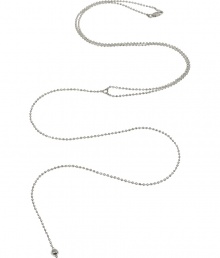 Simplistic ball-and-chain necklace in sterling silver - Features a sexy y shape drop - Designed by Argentinian leather and jewelry crafter Mara Carrizo Scalise - Looks great dressed up or down, with an deep v-neck tee and jeans, or in a sleek cocktail dress with a plunging neckline