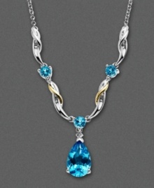 Swirls of 14k gold and sterling silver surround vibrant blue topaz gemstones (4-3/8 ct. t.w.).  Necklace features a teardrop design and includes diamond accents. Approximate length: 14 inches. Approximate drop: 1/2 inch.