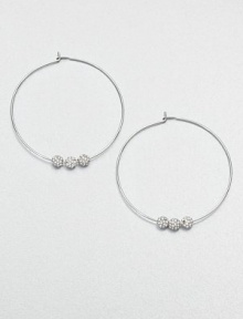 From the Brilliance Collection. A slender wire hoop, adorned with three sparkling beads, creates a look of understated glamour.GlassSilvertoneDiameter, about 1.25PiercedImported