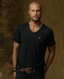 The embodiment of effortless style, this relaxed V-neck tee in soft cotton jersey looks great layered or all on its own.