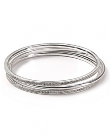 Lauren by Ralph Lauren's sterling silver and crystal bangles are a lesson in simple chic. Wear them alone for classic style or work an armful to channel of-the-moment glamour.