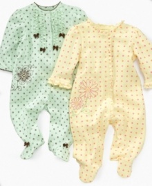 Florals and ruffles: a match made in heaven! She's cute as can be in these footed coveralls from Little Me.