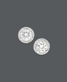 For the girl with impeccable taste. Stunning stud earrings highlight round-cut diamond centers surrounded by a halo of round-cut diamond accents (1/2 ct. t.w.). Set in 14k white gold. Approximate diameter: 4 mm.