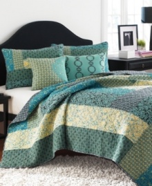 An array of flourishes and florals in a palette of aqua, yellow and brown come together in this Reba quilt from Steve Madden for an artistically ornate appeal. Different patterns are pieced together for an eclectic touch.