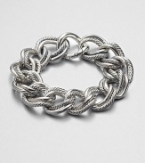 From the Chain Collection. A simply chic design that features a mix of cabled and smooth links. Sterling silverLength, about 7.5Push clasp closureImported 