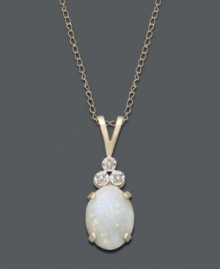 An iridescent sheen adds elegance to any look. Necklace features an oval-cut opal (9/10 ct. t.w.) accented by three, round-cut, diamond accents. Setting and chain crafted in 14k gold. Approximate length: 18 inches. Approximate drop: 3/4 inch.