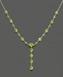 Shine bright with this gorgeous 14k white gold necklace featuring peridot (7-3/4 ct. t.w.) in round, heart and oval cuts. Approximate length: 17 inches. Approximate drop: 1-1/4 inch.