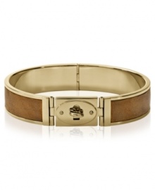 Stay ahead of the pack with Fossil's luggage-style bracelet. Crafted from gold-tone stainless steel, the bracelet also features a turnlock closure for a fashion-forward look. Approximate diameter: 2-5/8 inches.