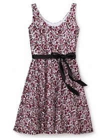 Party dress perfect by Un Deux Trois, this festive style maven flaunts a classic grosgrain ribbon waist amidst a bloom of rose-colored flowers.