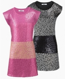 She's all the glitters in this fabulous party dress by DKNY.