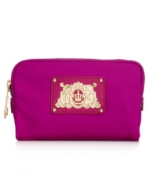 Pretty practical, this cosmetic case from Juicy Couture is the perfect it girl accessory. Crafted in soft yet sturdy nylon with luxe signature hardware, it elegantly stows your beauty must-have when you're on-the-move.