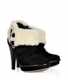 Show off your high style while staying warm in these ultra-chic shearling lined high heel booties from UGG Australia - Round toe, platform, crease-detailed front, shearling cuff with button details, chunky high heel, side zip closure - Pair with skinny jeans, an oversized cashmere sweater, and a down jacket or wool cape