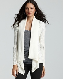 From frigid offices to chilly nights, this GUESS drape sweater has you covered.