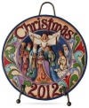 A beautiful, artful reminder to the true meaning of Christmas, this commemorative plate portrays a colorful manger scene with a joyous angel heralding in good tidings for the year to come.