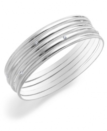 Shine on! Add an eye-catching element to your wardrobe with this stylish set of five bangle bracelets from Charter Club. Made in silver tone mixed metal, they'll look equally chic worn together or individually. Approximate diameter: 2-1/2 inches. Item comes packaged in a signature gift box.