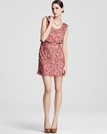 Aidan Mattox perfects eye-catching party style with this sequin-encrusted dress.