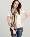 Make a nod to neutrals with this Eileen Fisher scarf that is all flourish and flair.